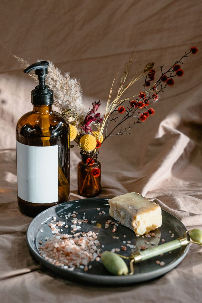 Tranquil setup of skincare and aromatherapy products with a natural touch, perfect for self-care routines.